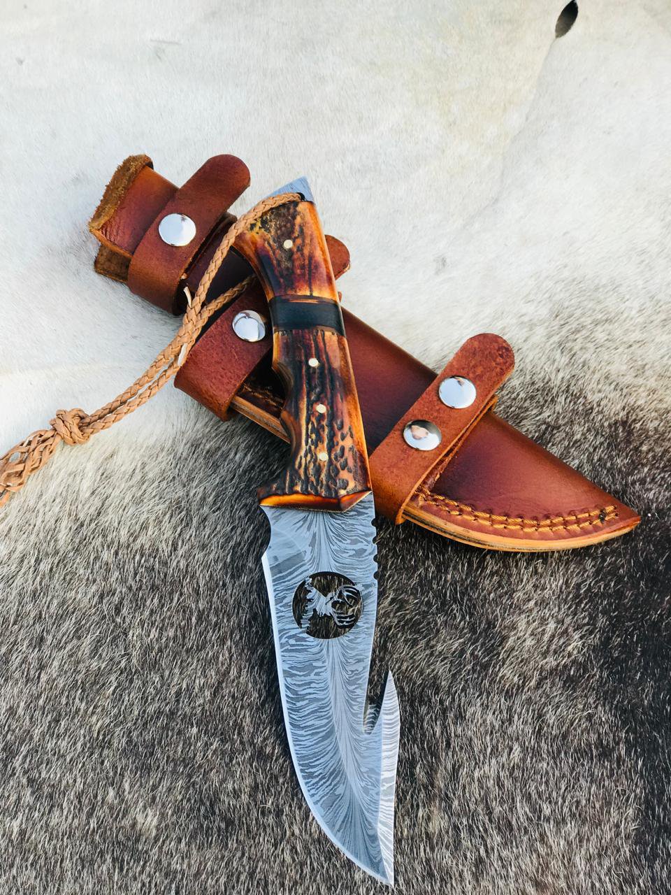 Handmade 11" Damascus Steel Feather Pattern Gut Hook Knife with Deer on Blade With Antler Handle
MZ:11