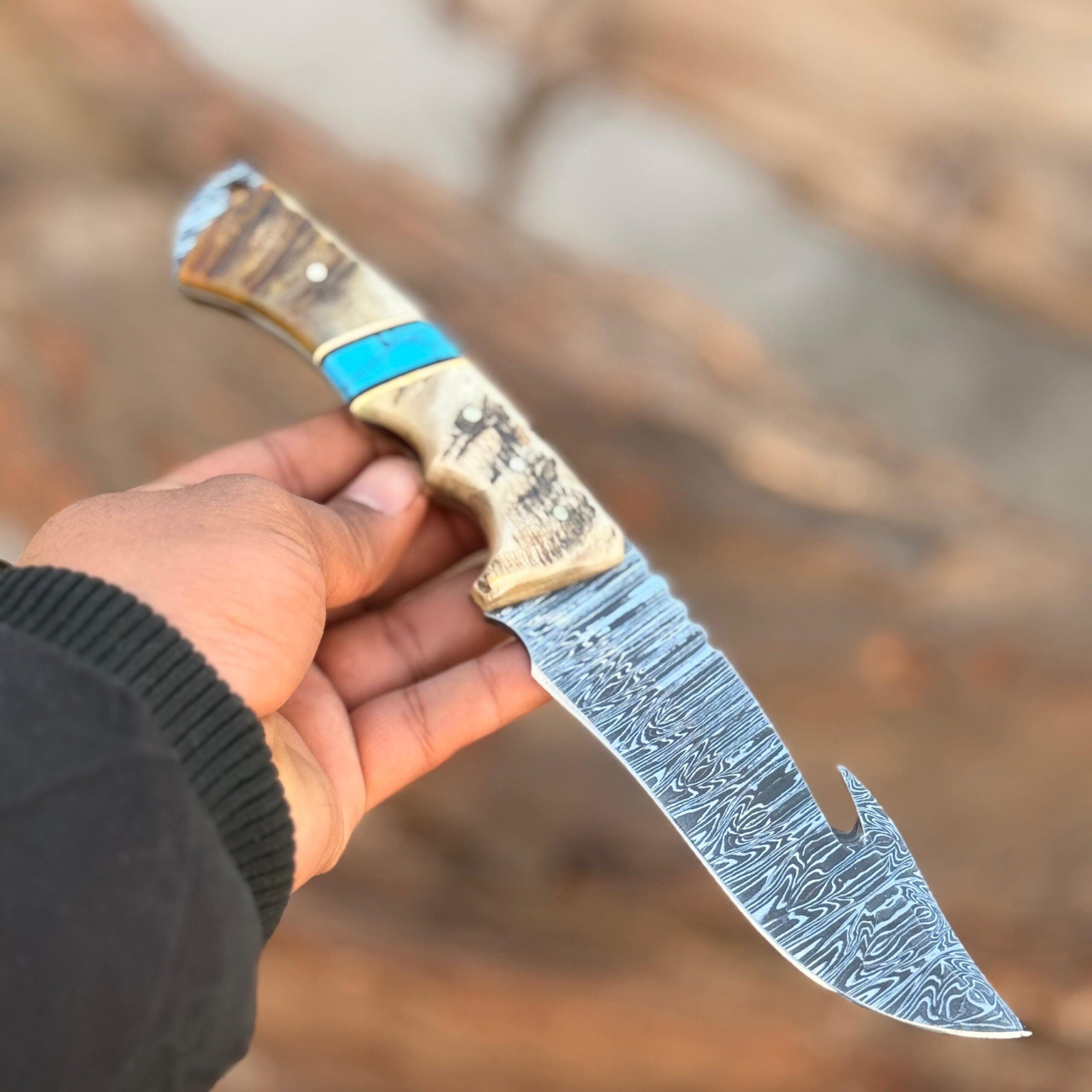 Handcrafted 11″ Damascus Gut Hook Knife with Bone, Stone & Sheep Horn Handle
MZ:20 - Image 2